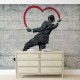 Banksy Graffiti pe perete de beton: Love is in the air!  - fototapet